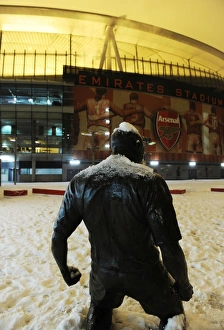 Winter's Battle at Emirates: Arsenal vs. Blackburn Rovers Amidst a Snow-Covered Stadium
