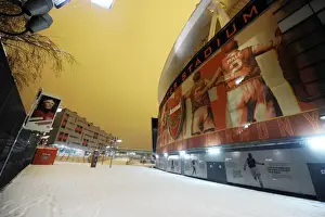 Winter's Embrace: Arsenal's Emirates Stadium Transformed by Snow