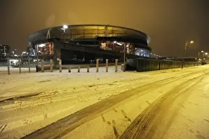 Winter's Embrace at Emirates: Arsenal Football Club under Snow