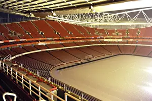 Winter's Grip: Arsenal's Emirates Stadium Blanketed in Snow