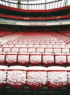 Winter's Magic at Emirates: A Snowy Arsenal Football Stadium