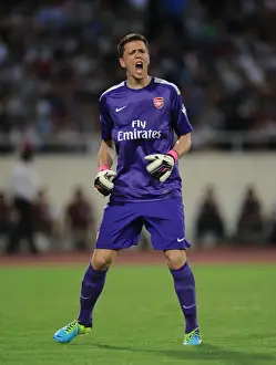 Vietnam V Arsenal 2013-14 Prints: Wojciech Szczesny: Arsenal's Star Goalkeeper in Action against Vietnam (2013)