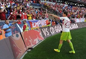 Images Dated 26th July 2014: Wojciech Szczesny Gifts Gloves to Fan after Arsenal's Pre-Season Win over New York Red Bulls