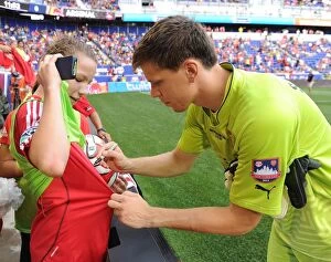 Images Dated 26th July 2014: Wojciech Szczesny Interacts with Ball Girl at Arsenal's Pre-Season Friendly vs New York Red Bulls