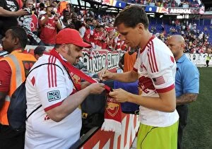 Images Dated 26th July 2014: Wojciech Szczesny Signs Autographs for Fans after Arsenal's Pre-Season Match vs. New York Red Bulls