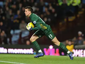 Aston Villa V Arsenal 2011-12 Prints: Wojciech Szczesny's Unyielding Guard: Heroic Performance at Villa Park (Aston Villa vs Arsenal 2011-12)
