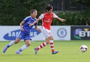 Chelsea Ladies V Arsenal Ladies 2014 Prints: WSL Showdown: Yukari Kinga vs. Yuki Ogimi - A Battle of Skills and Determination