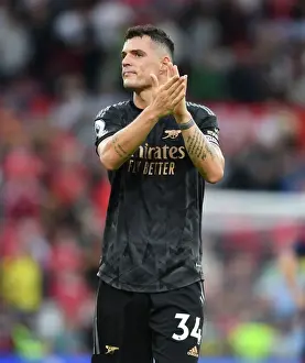 Manchester United V Arsenal 2022-23 Prints: Xhaka Applauds Arsenal Fans: Manchester United vs Arsenal FC, Premier League 2022-23