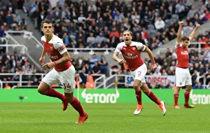 Newcastle United V Arsenal 2018-19 Prints: Xhaka and Bellerin Celebrate Arsenal's First Goal Against Newcastle United (2018-19)