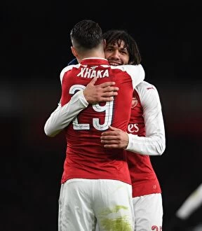 Images Dated 24th January 2018: Xhaka and Elneny Celebrate Arsenal's Carabao Cup Semi-Final Goals Against Chelsea