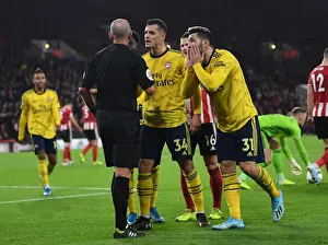Xhaka and Kolasinac Confront Referee Mike Dean During Sheffield United vs. Arsenal Premier League Clash