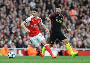 Images Dated 2nd April 2017: Xhaka vs. Aguero: Intense Battle Between Arsenal and Manchester City, Premier League 2016-17