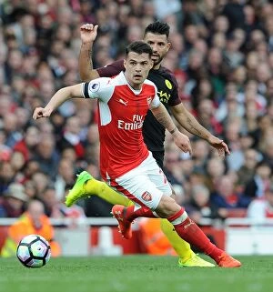 Images Dated 2nd April 2017: Xhaka vs. Aguero: Intense Battle at the Emirates - Arsenal vs. Manchester City, Premier League