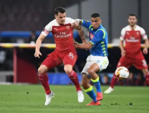 Napoli V Arsenal 2018-19 Prints: Xhaka vs Allan: A Midfield Showdown in Napoli's Europa League Battle against Arsenal