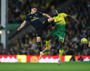 Norwich City V Arsenal 2019-20 Prints: Xhaka vs Amadou: A Midfield Battle in Norwich City vs Arsenal FC