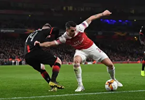 Arsenal V Stade Rennais 2018-19 Prints: Xhaka vs Bourigeaud: Intense Clash in Arsenal v Stade Rennais UEFA Europa League Showdown