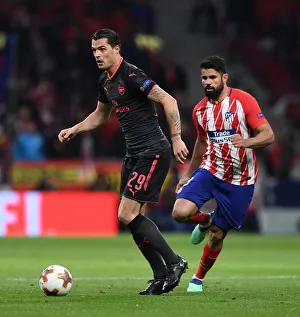 Atletico Madrid V Arsenal 2017-18 Prints: Xhaka vs Costa: Battle in the Europa League Semi-Final