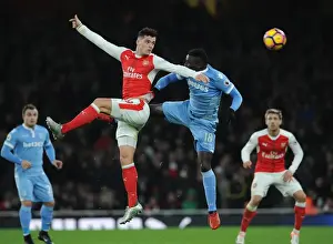 Arsenal V Stoke City 2016-17 Prints: Xhaka vs Diouf: Heading Battle at Emirates Stadium - Arsenal vs Stoke City
