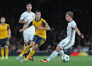 Arsenal V FC Basel 2016-17 Prints: Xhaka vs. Fransson: A Battle for Ball Possession in Arsenal's UEFA Champions League Clash against FC Basel