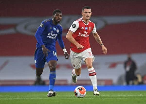 Arsenal v Leicester City 2019-20 Collection: Xhaka vs Iheanacho: A Premier League Showdown at Emirates