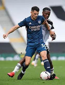 Fulham V Arsenal 2020-21 Prints: Xhaka vs Onomah: Intense Clash in Fulham vs Arsenal Premier League Encounter