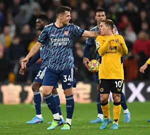 Wolverhampton Wanderers V Arsenal 2021-22 Prints: Xhaka vs. Podence: Clash of the Midfielders - Wolverhampton Wanderers vs