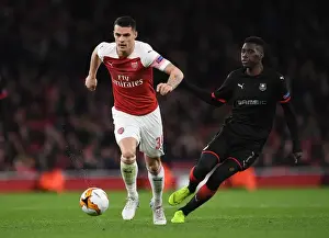 Arsenal V Stade Rennais 2018-19 Prints: Xhaka vs Sarr: A Europa League Battle at Emirates Stadium