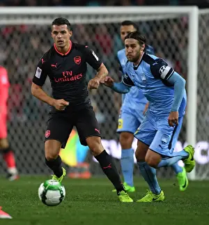 Sydney FC V Arsenal - 2017-18 Prints: Xhaka vs Zullo: Sydney FC vs Arsenal Pre-Season Clash