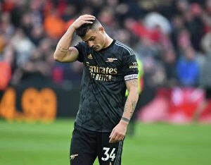 Liverpool v Arsenal 2022-23 Collection: Xhaka's Disappointment: Liverpool's Victory Over Arsenal in the Premier League (2022-23)