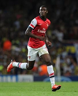 Uefa Champions Laegue Collection: Yaya Sanogo in Action: Arsenal vs Fenerbahce, UEFA Champions League Play-offs (2013)