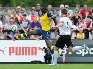 Boreham Wood V Arsenal Prints: Yaya Sanogo (Arsenal) Callum Reynolds (Boreham Wood)