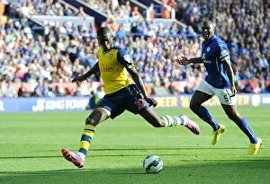 Leicester City v Arsenal 2014-15 Collection: Yaya Sanogo (Arsenal) Wes Morgan (Leicester). Leicester City 1: 1 Arsenal. Barclays Premier League