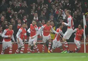 Yaya Sanogo celebrates scoring Arsenals 1st goal with his team mates. Arsenal 2