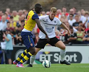 Boreham Wood V Arsenal Prints: Yaya Sanogo vs Callum Reynolds: A Pre-Season Battle at Borehamwood
