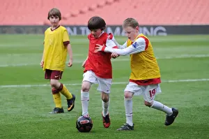 Arsenal V Aston Villa 2010-11 Prints: Young Gunners Struggle: Arsenal 1-2 Aston Villa (2011) - A Junior Gunner Fights On