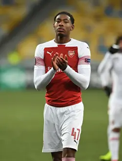 FC Vorskla Poltava V Arsenal 2018-19 Prints: Zech Medley Celebrates with Arsenal Fans after Europa League Victory over Vorskla Poltava